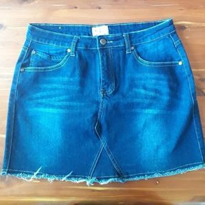 New without tags jean skirt with raw hem